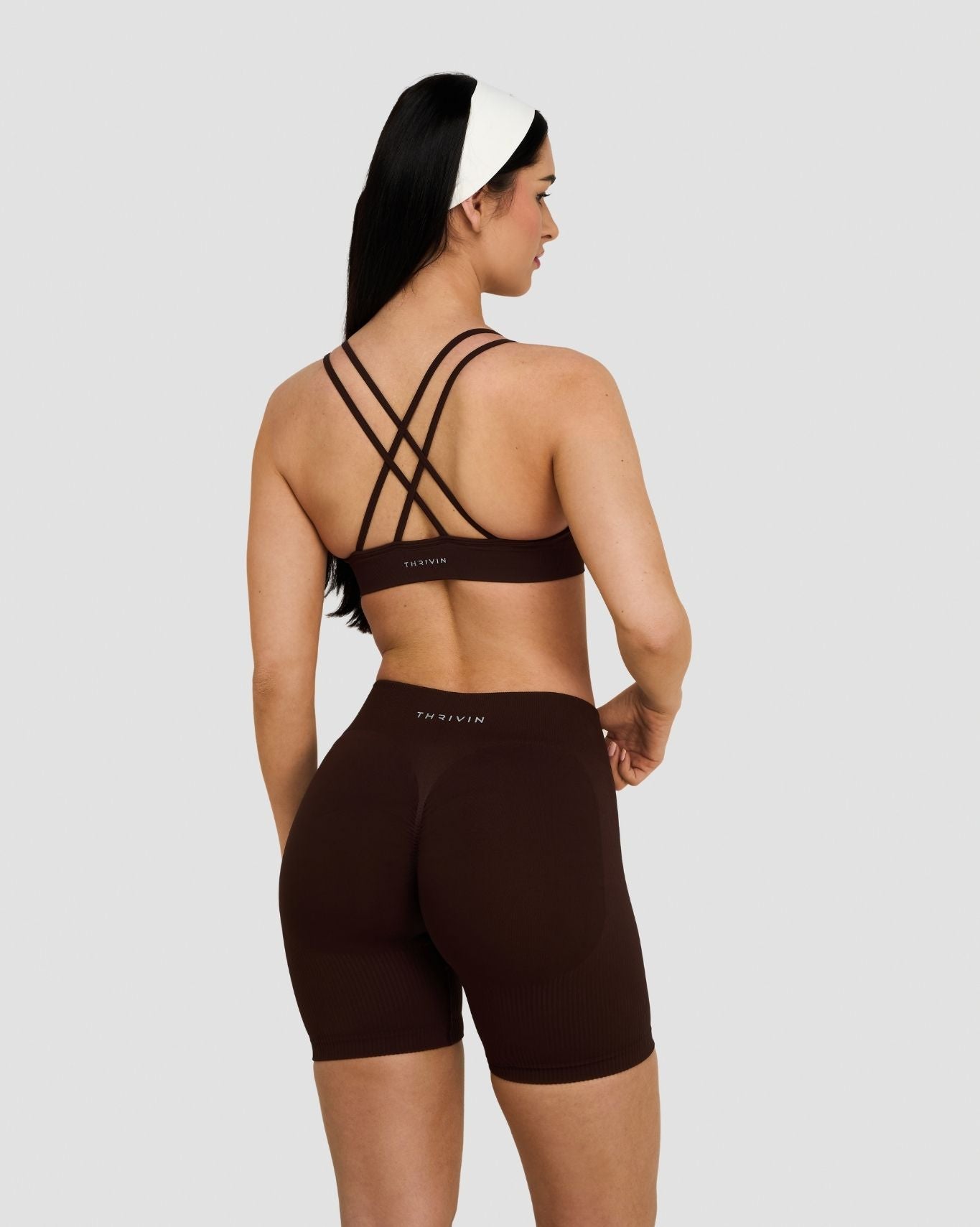 Elevate Sculpting Seamless High Apex Bra in Coffee Brown, back view of strappy crossback, with matching shorts