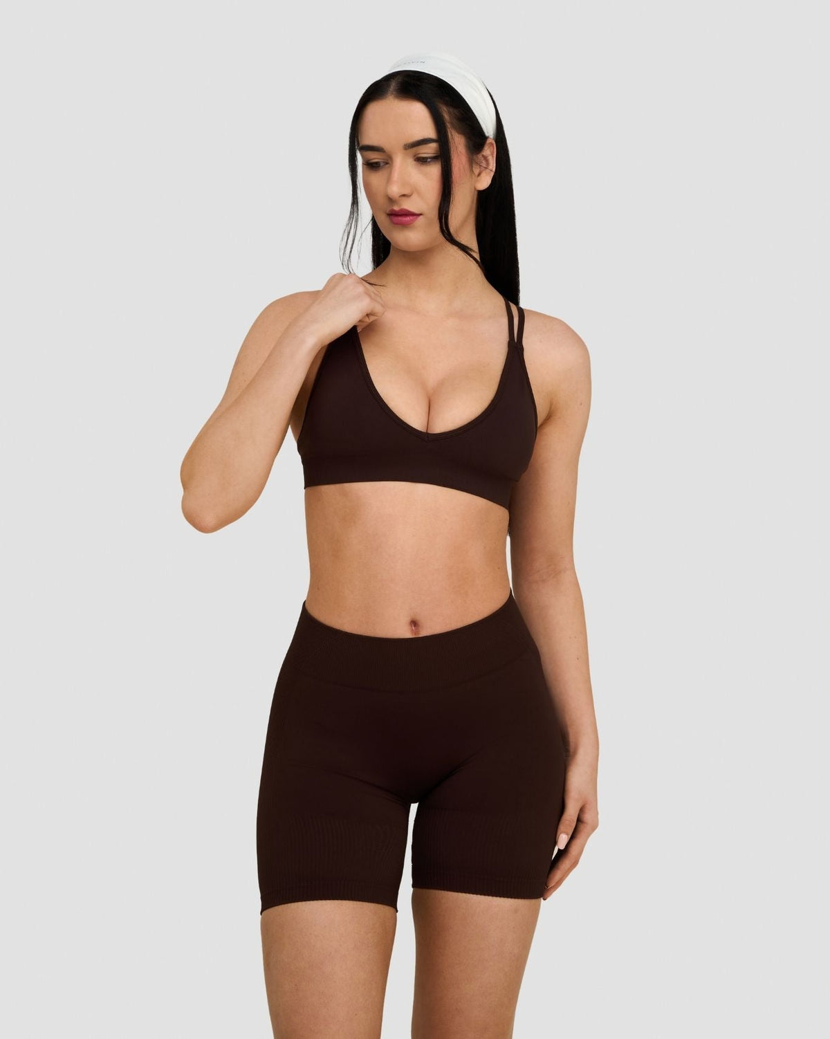 Elevate Sculpting Seamless High Apex Bra in Coffee Brown, front three-quarter view with V-neckline and matching shorts