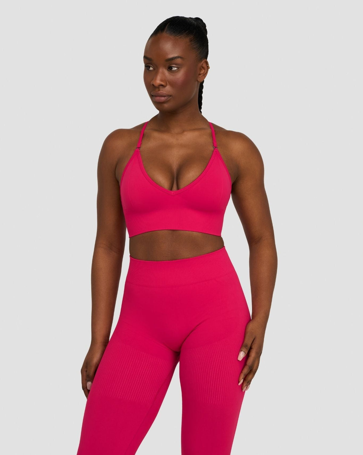 Elevate Multiway Sculpt Seamless Bra in Strawberry, front view styled with matching leggings