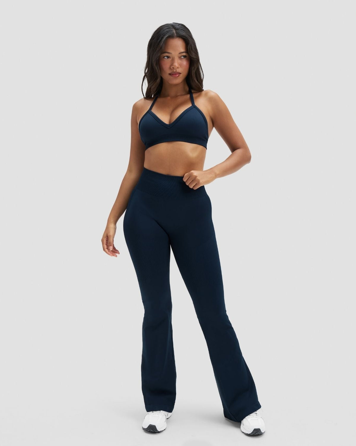 Elevate Sculpting High Waist Flare Leggings in Midnight Navy Blue, front view styled with matching bra