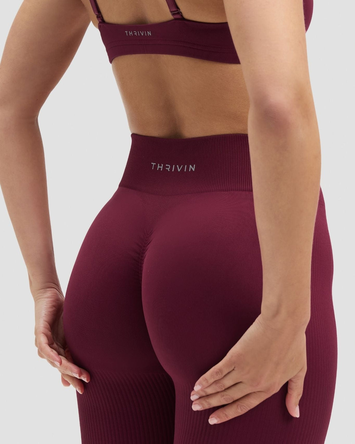 Elevate Sculpting Mid Waist Scrunch Leggings in Cherry Berry, back close-up of high waistband and bra