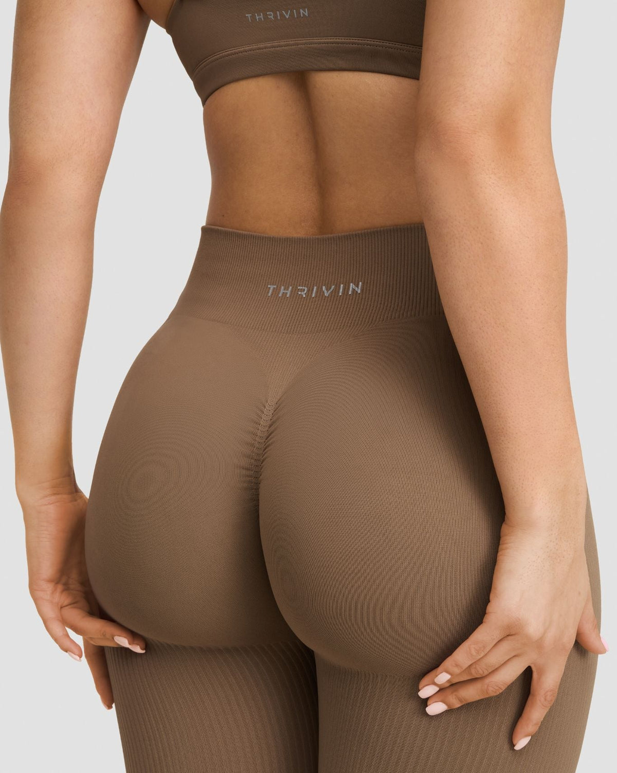 Elevate Sculpting Mid Waist Scrunch Leggings in Toffee, back close-up of seamless fit and waistband