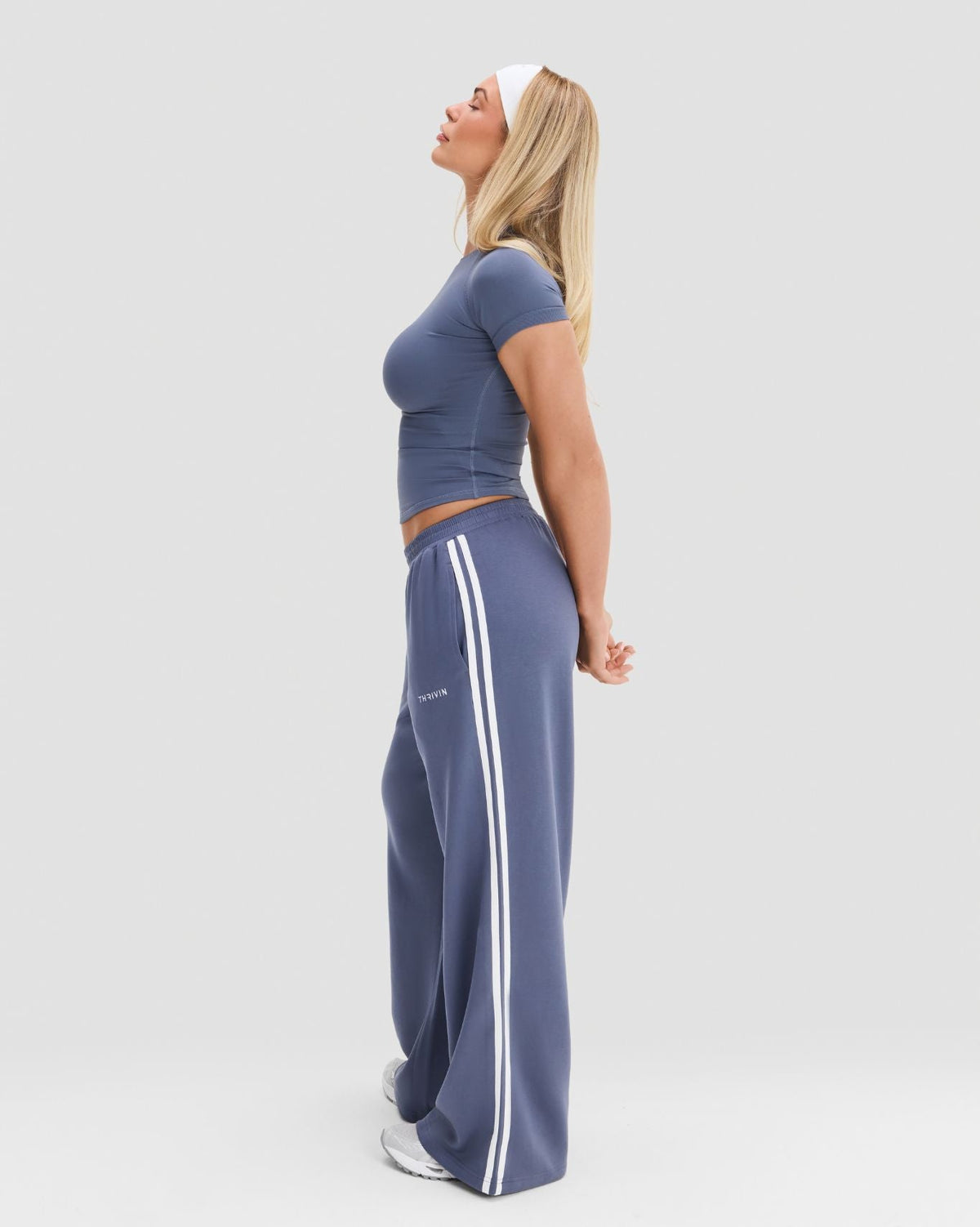 Wide Leg Striped Joggers in Steel Blue, side view of full-length double white stripe and loose wide leg