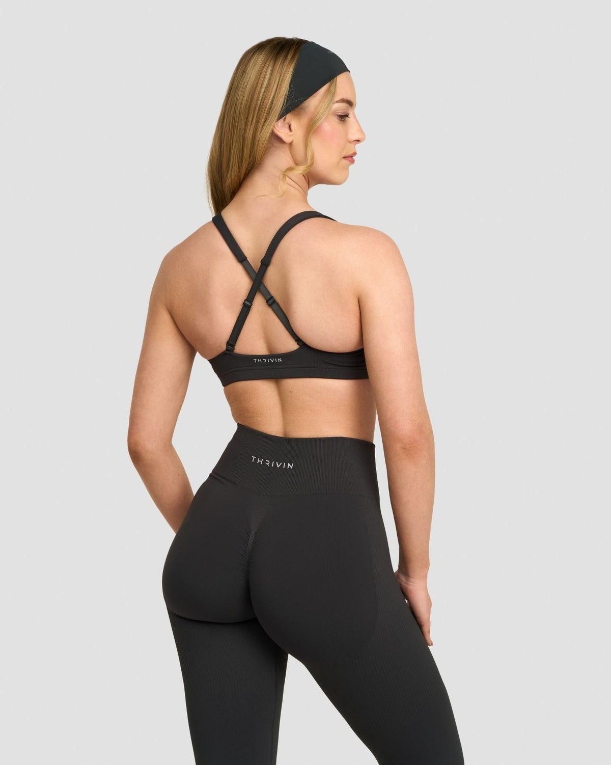 Elevate Sculpting Medium Impact Multiway Bra in Charcoal Grey, back view showing crossed straps