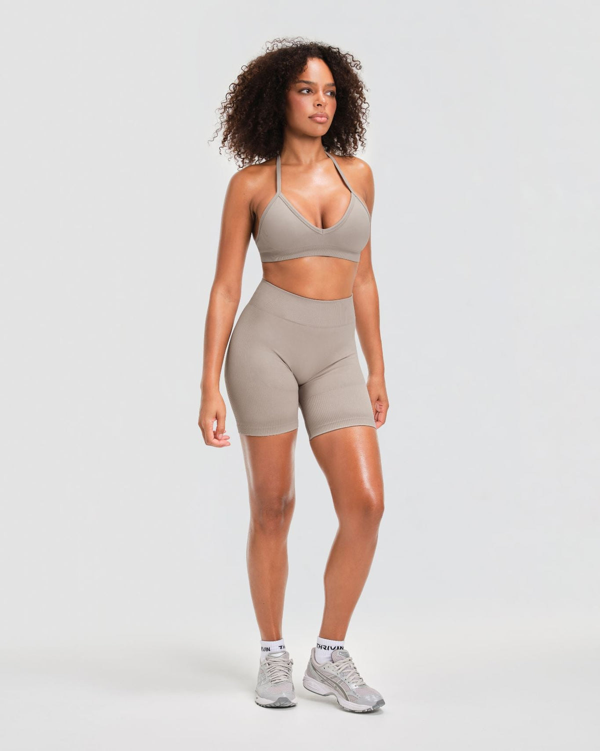 Elevate Sculpting Mid Waist Scrunch Shorts in Latte Grey, full-length front view of mid waist rise and regular inseam