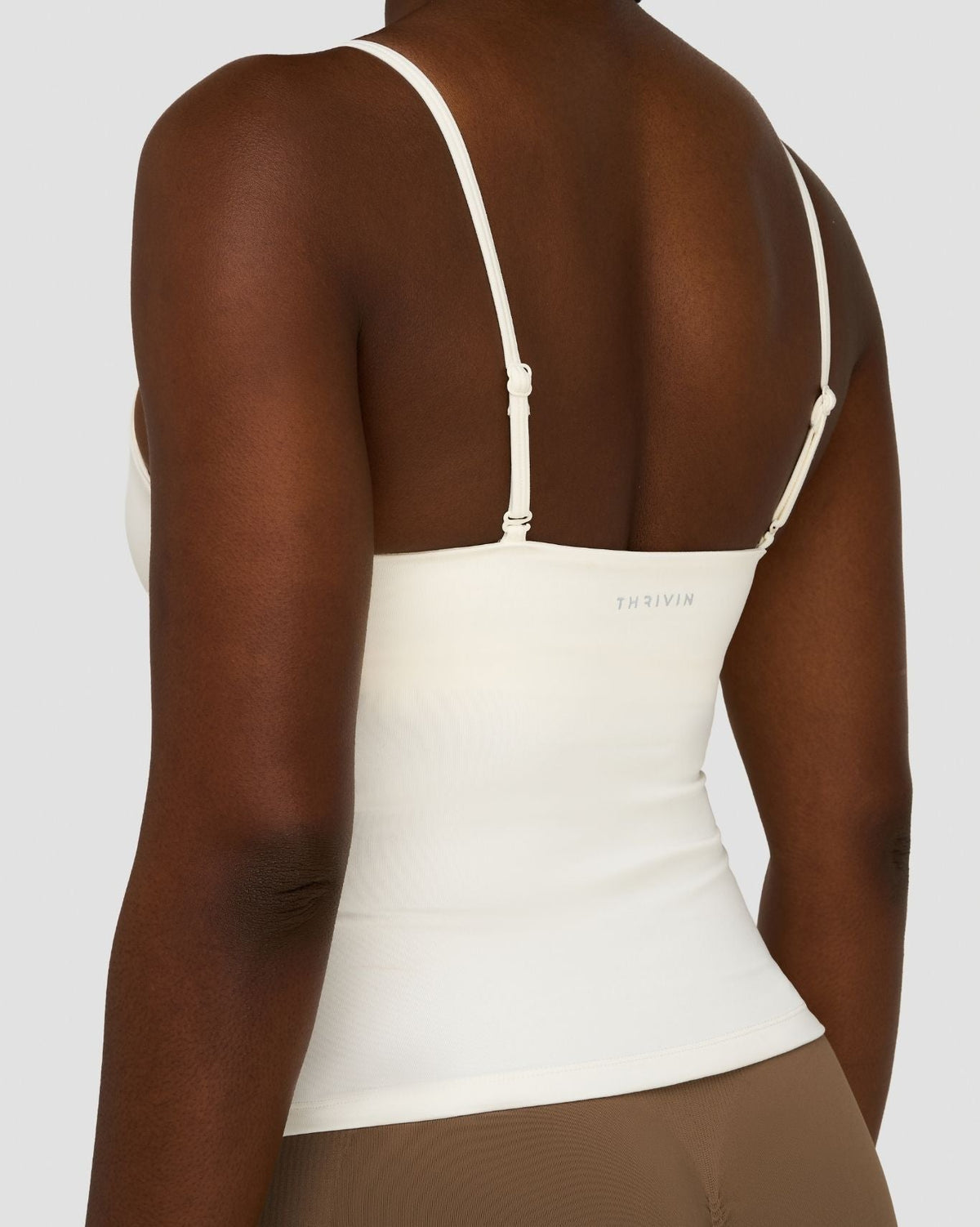 Elevate Sculpting Seamless Scoop Neck Cami in Cream, back close-up of straps and hem