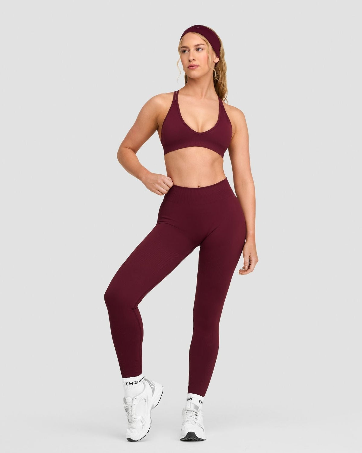 Elevate Sculpting Mid Waist Scrunch Leggings in Merlot, full-length three-quarter front view of high waistband