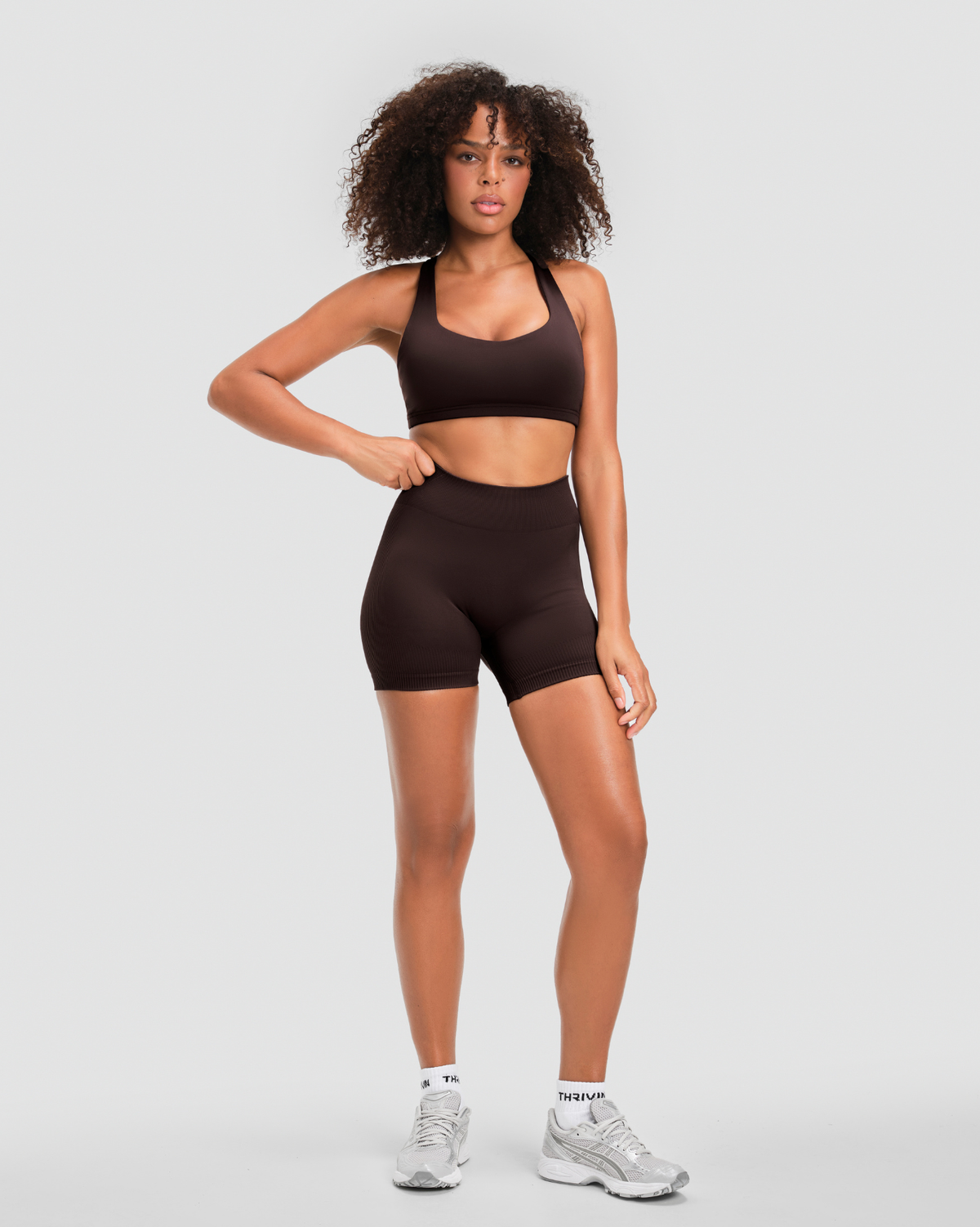 Elevate Sculpting Mid Waist Scrunch Shorter Shorts in Coffee Brown, full-length front view with mid waistband and short leg