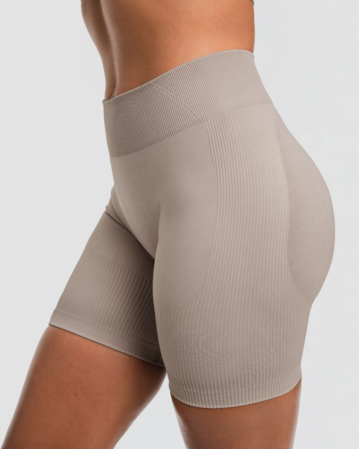 Elevate Sculpting Mid Waist Scrunch Shorts in Latte Grey, side close-up of waistband seam and ribbed sculpting knit