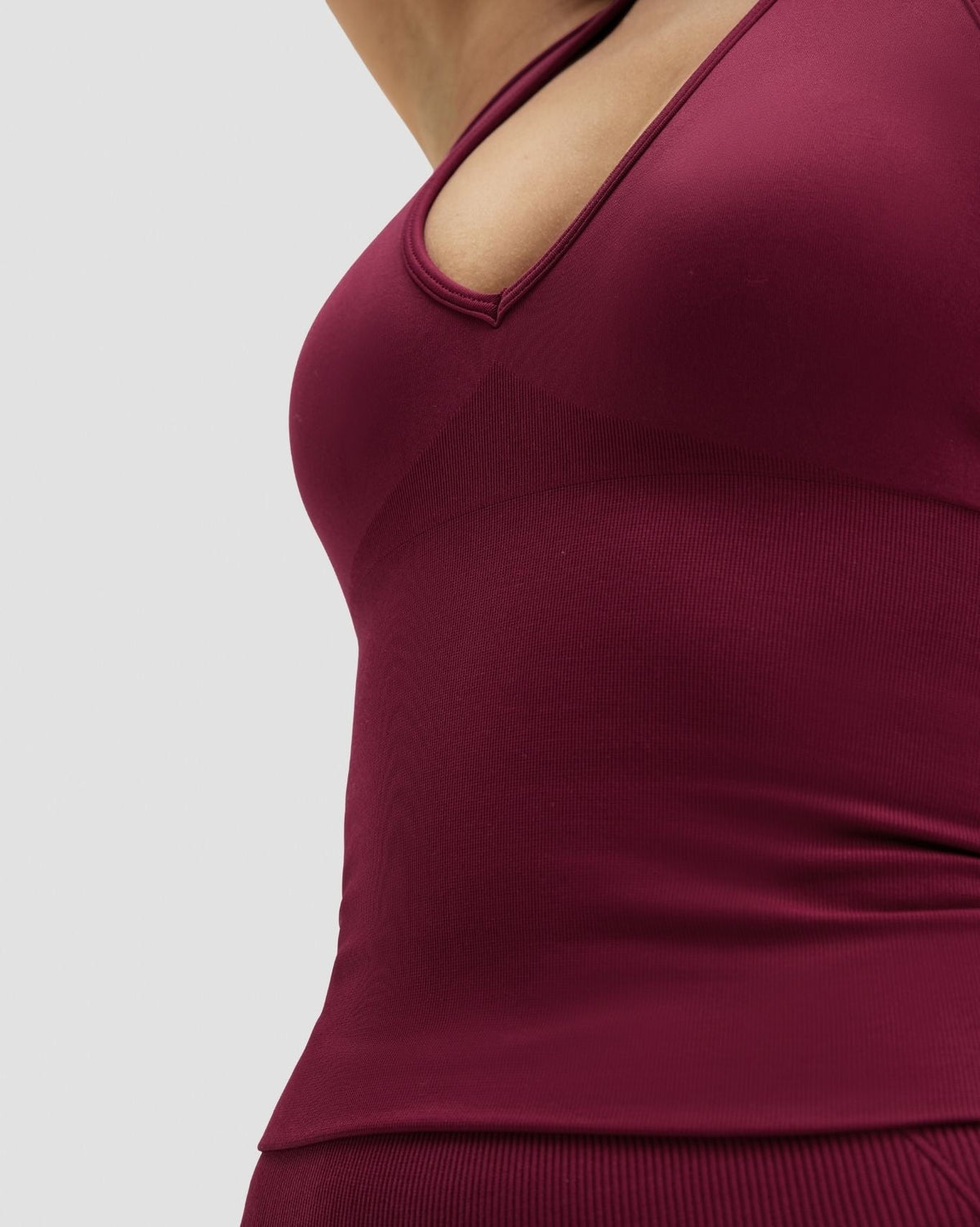 Elevate Sculpting Seamless Halterneck Top in Cherry Berry, close-up of halter neckline from the side