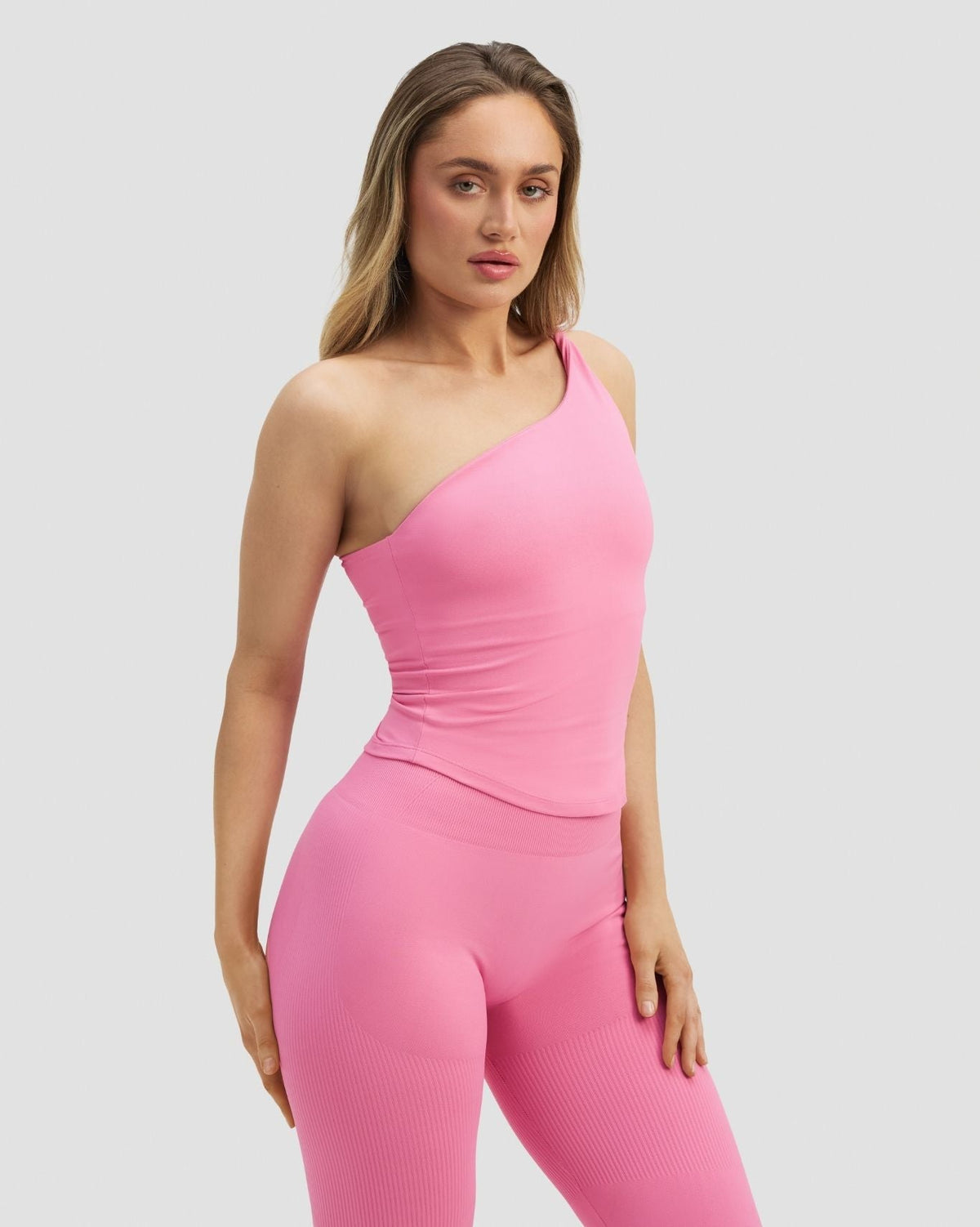 Elevate™ Sculpting Asymmetric Twist Top | Bubble Pink