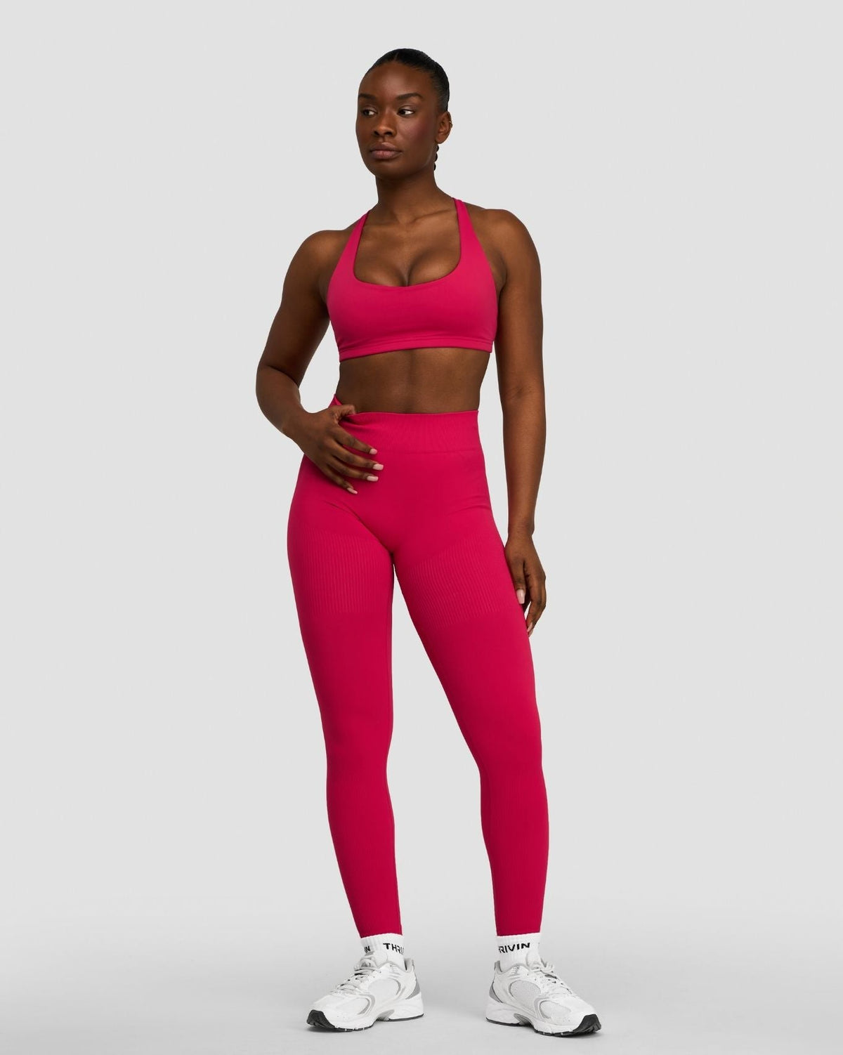 Elevate Sculpting Mid Waist Scrunch Leggings in Strawberry, full-length front view styled with a matching bra
