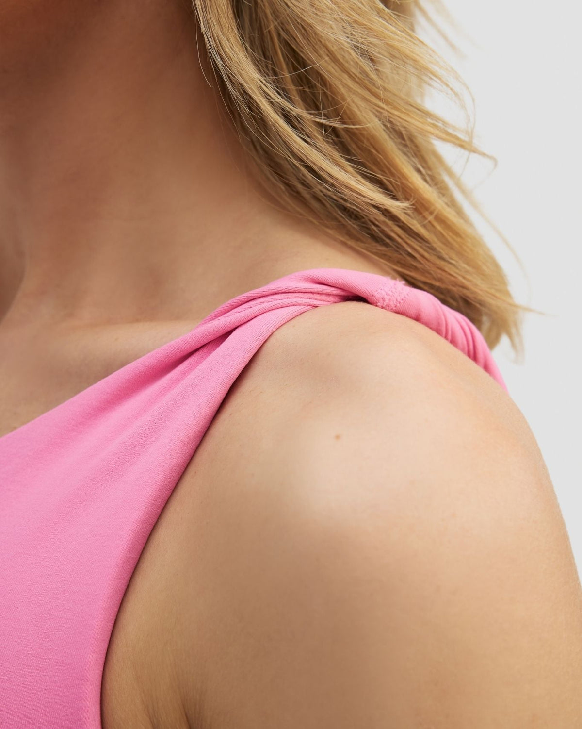 Elevate™ Sculpting Asymmetric Twist Top | Bubble Pink