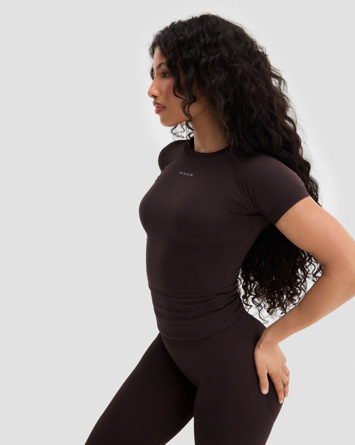 Elevate Compression T-Shirt in Coffee Brown, three-quarter side view of short sleeves and fit