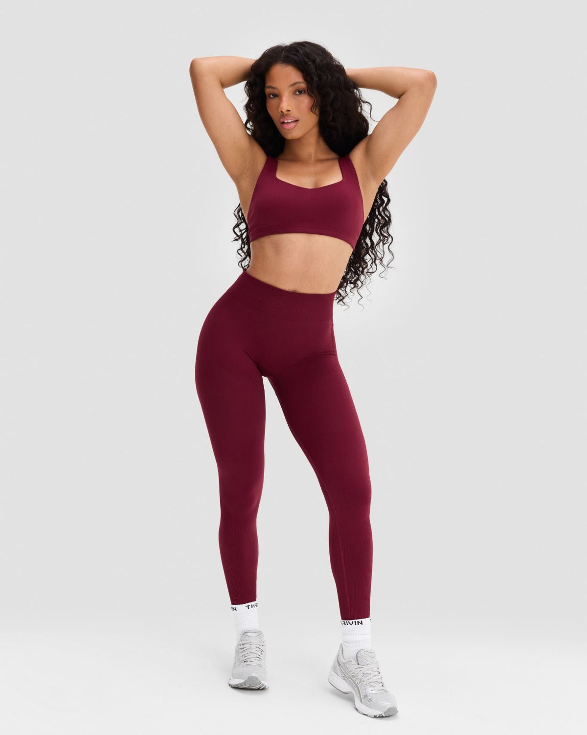 Elevate Sculpting Mid Waist Scrunch Leggings in Fine Wine Red, full-length front view with arms raised