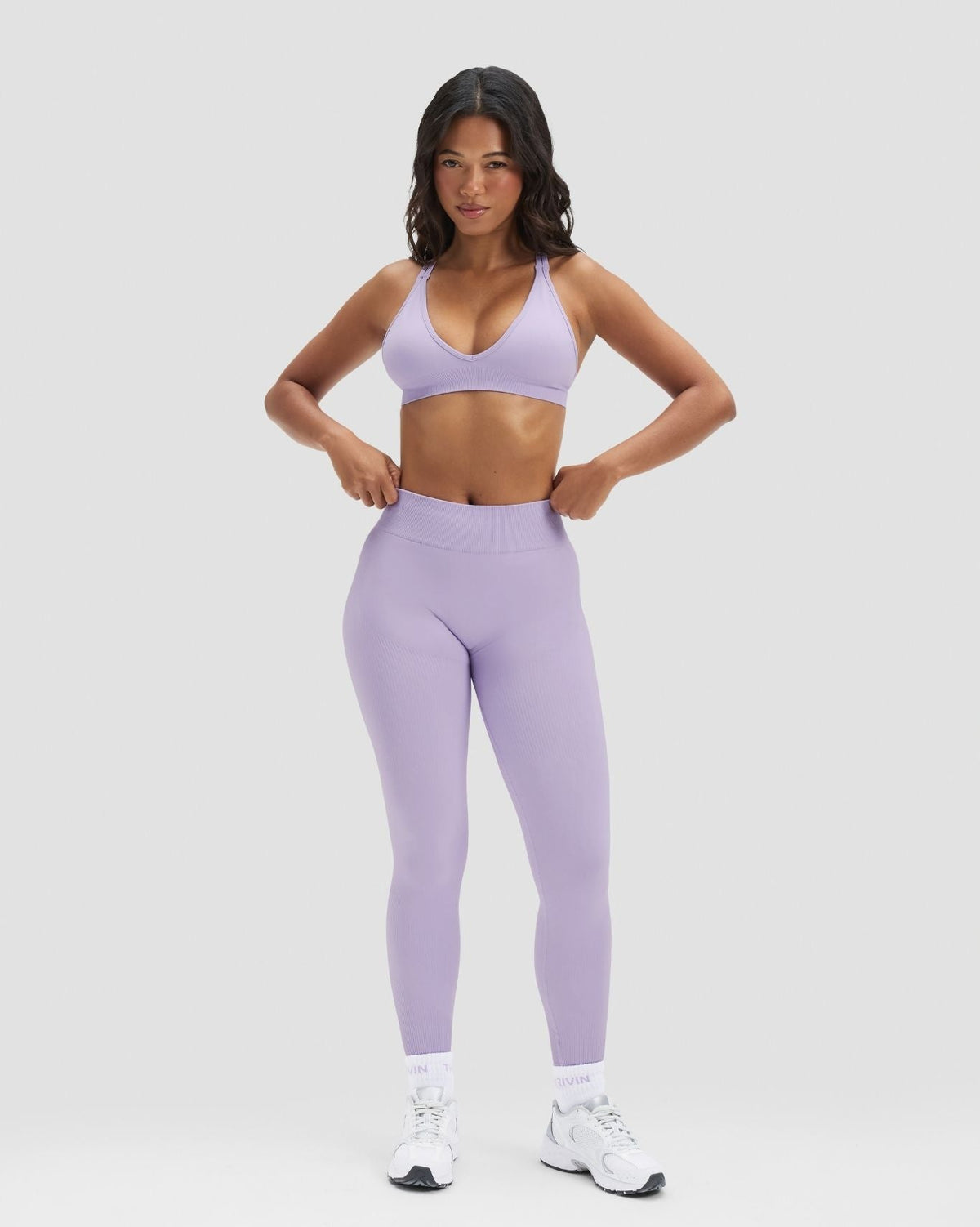 Elevate Sculpting Mid Waist Scrunch Leggings in Lilac, full-length front view styled with matching bra