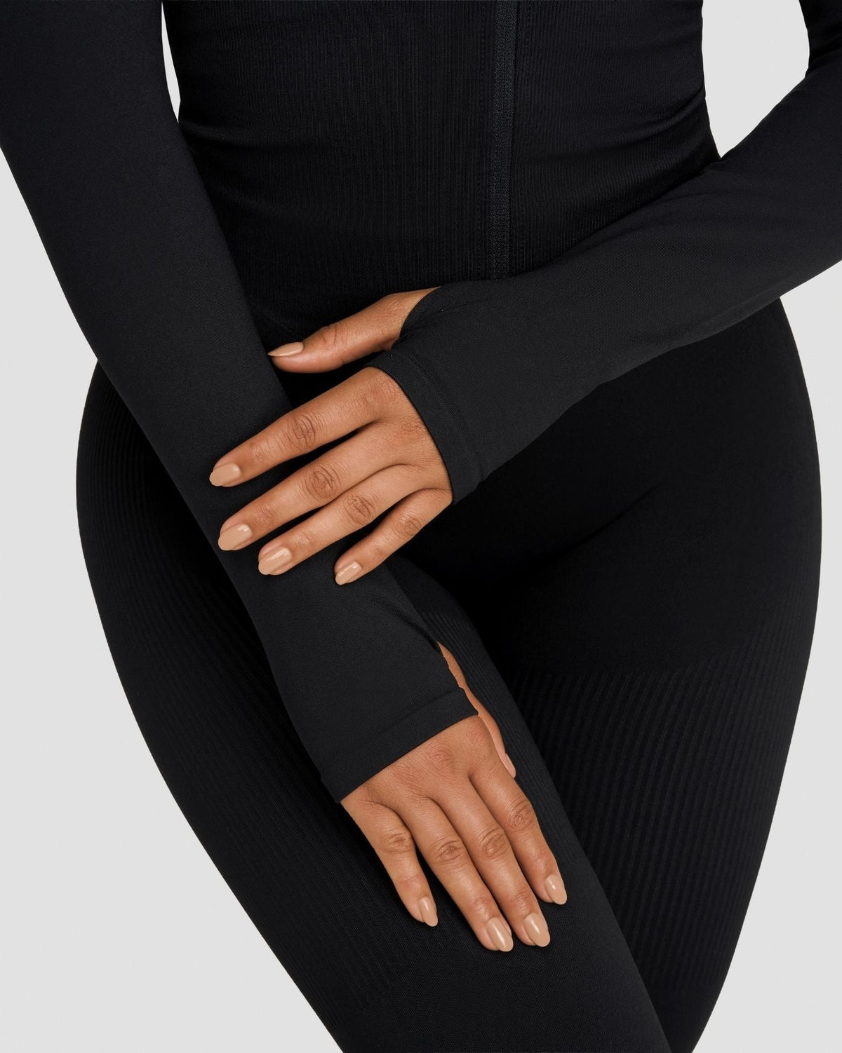 Elevate Compression Long Sleeve Jacket in Night Black, close-up of thumbhole cuff and sleeve