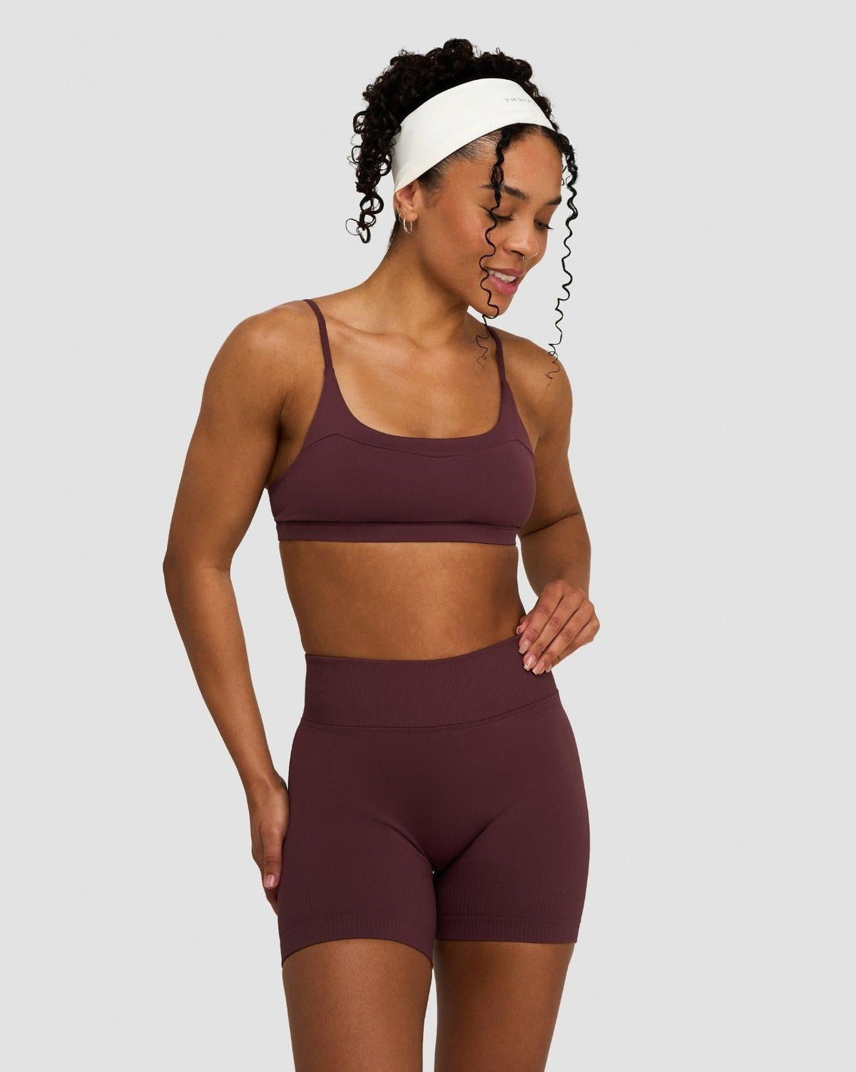 Elevate Sculpting Seamless Scoop Neck Bra in Dark Mauve, front view with scoop neckline and matching shorts