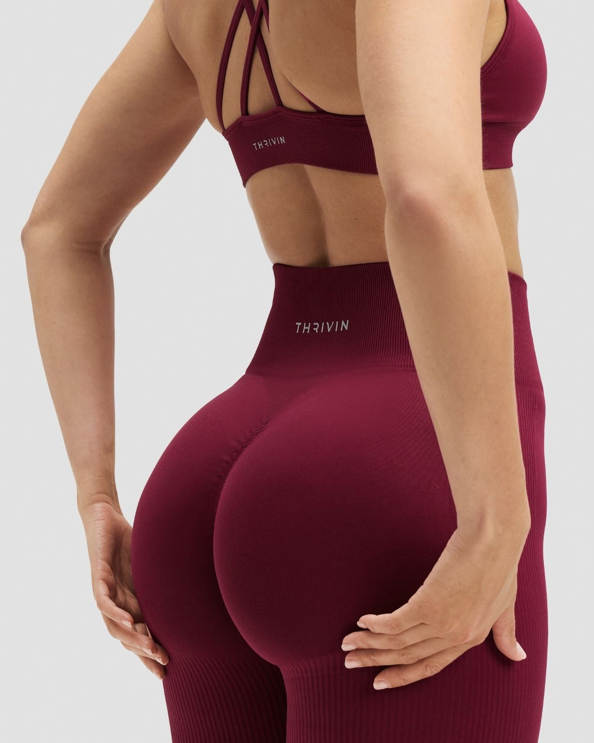 Elevate Sculpting High Waist Flare Leggings in Cherry Berry, back close-up of waistband and sculpted seat