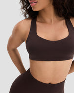Elevate Sculpting Medium Impact Multiway Bra in Coffee Brown, front close-up of scoop neckline