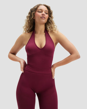 Elevate Sculpting Seamless Halterneck Top in Cherry Berry, front view with halter V-neckline, hands on hips