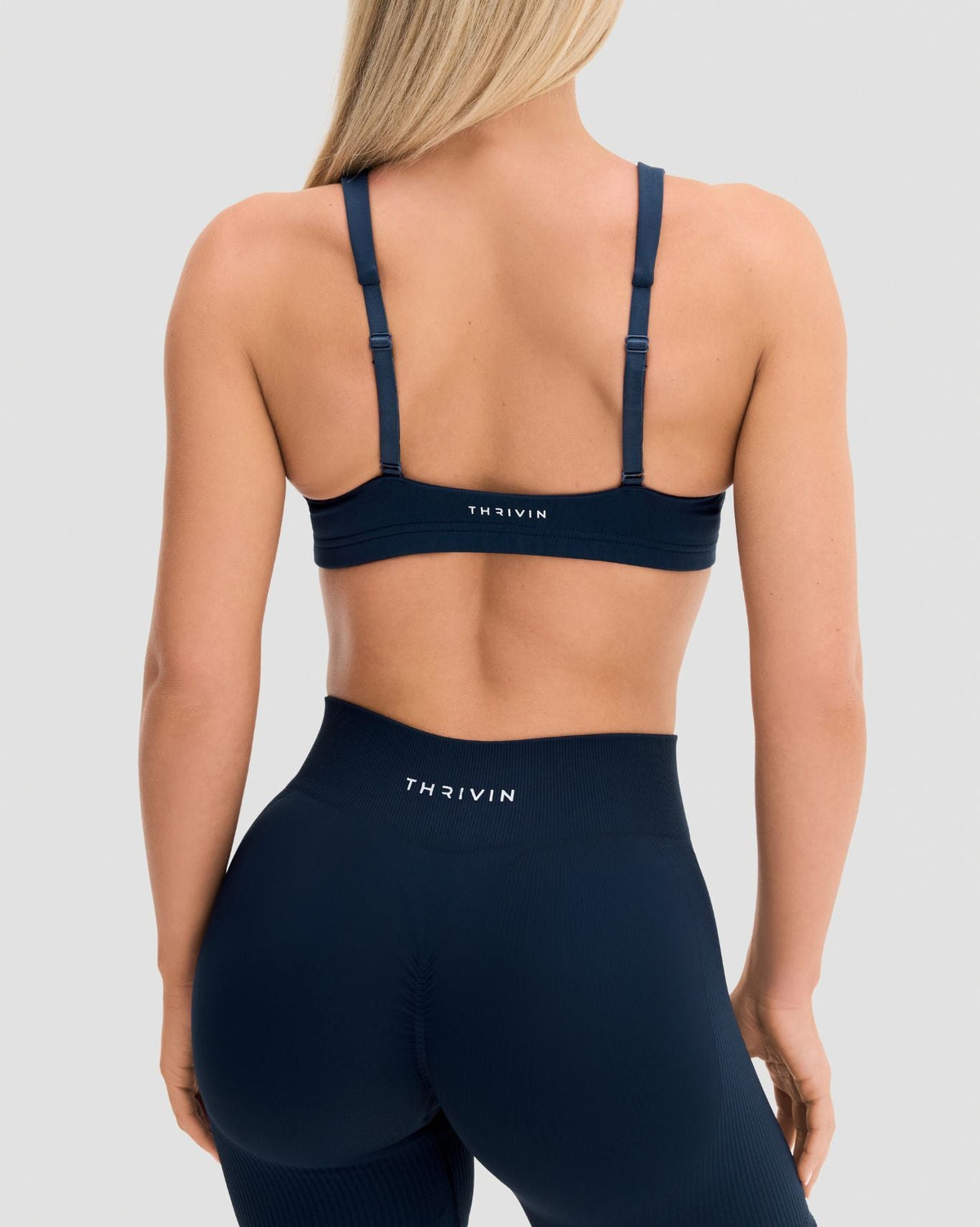 Elevate Sculpting Medium Impact Multiway Bra in Midnight Navy Blue, back view with straps