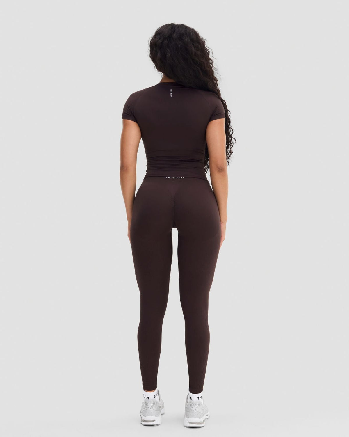 Elevate Compression T-Shirt in Coffee Brown, full back view styled with matching leggings