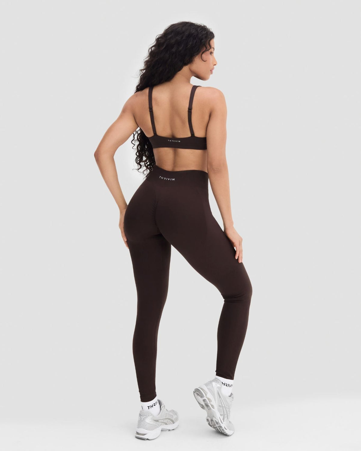 Elevate Sculpting Medium Impact Multiway Bra in Coffee Brown, full back view styled with leggings