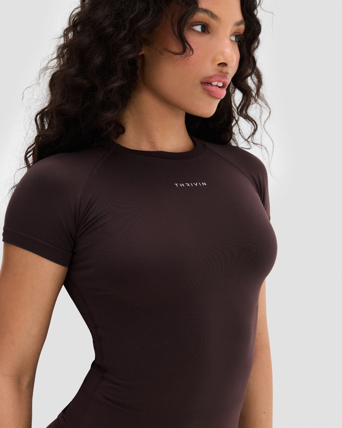 Elevate Compression T-Shirt in Coffee Brown, front close-up of neckline and THRIVIN logo