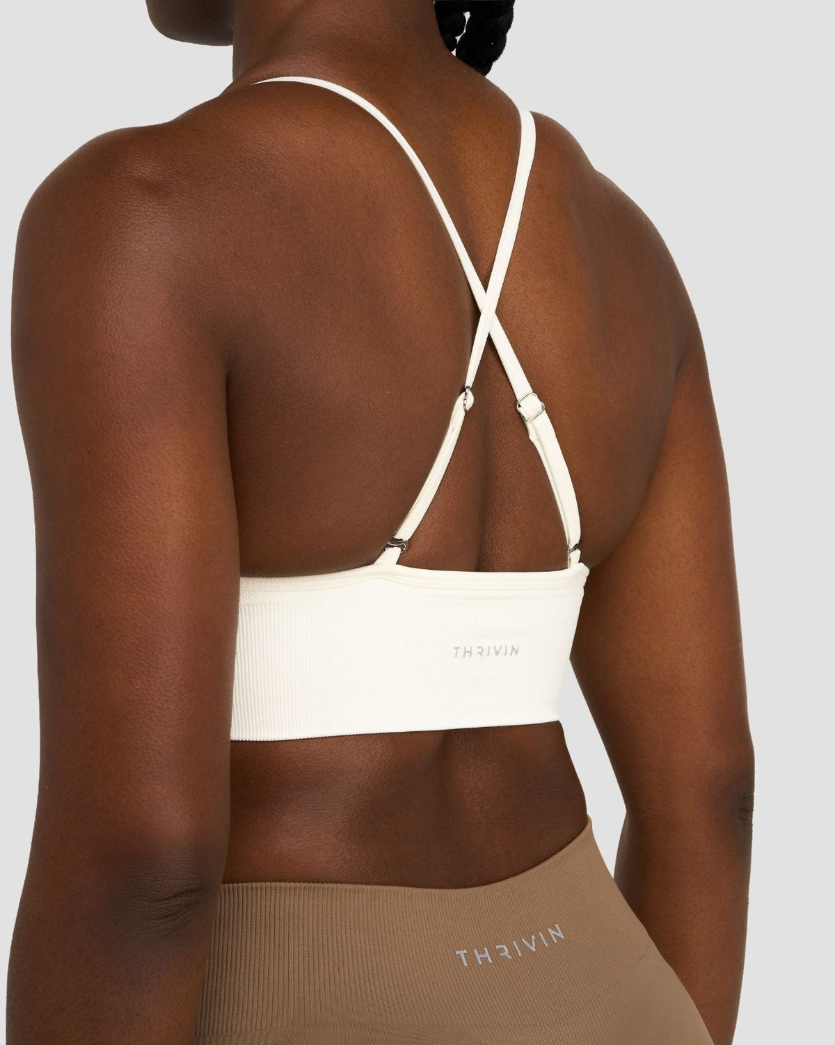 Elevate Multiway Sculpt Seamless Bra in Cream, back close-up of crossed straps