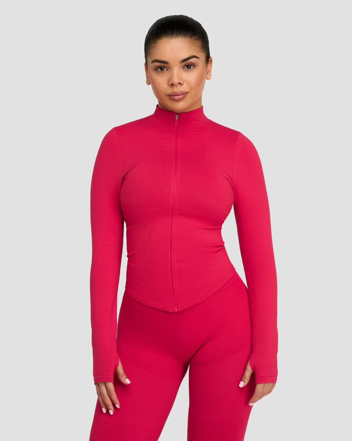 Elevate Compression Long Sleeve Jacket in Strawberry, front view zipped with matching leggings