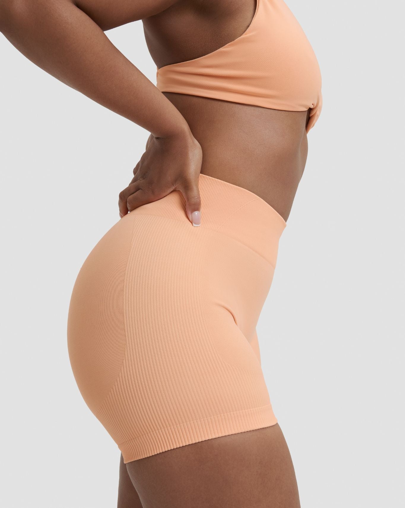 Elevate™ Sculpting Mid Waist Scrunch Shorter Shorts | Melon